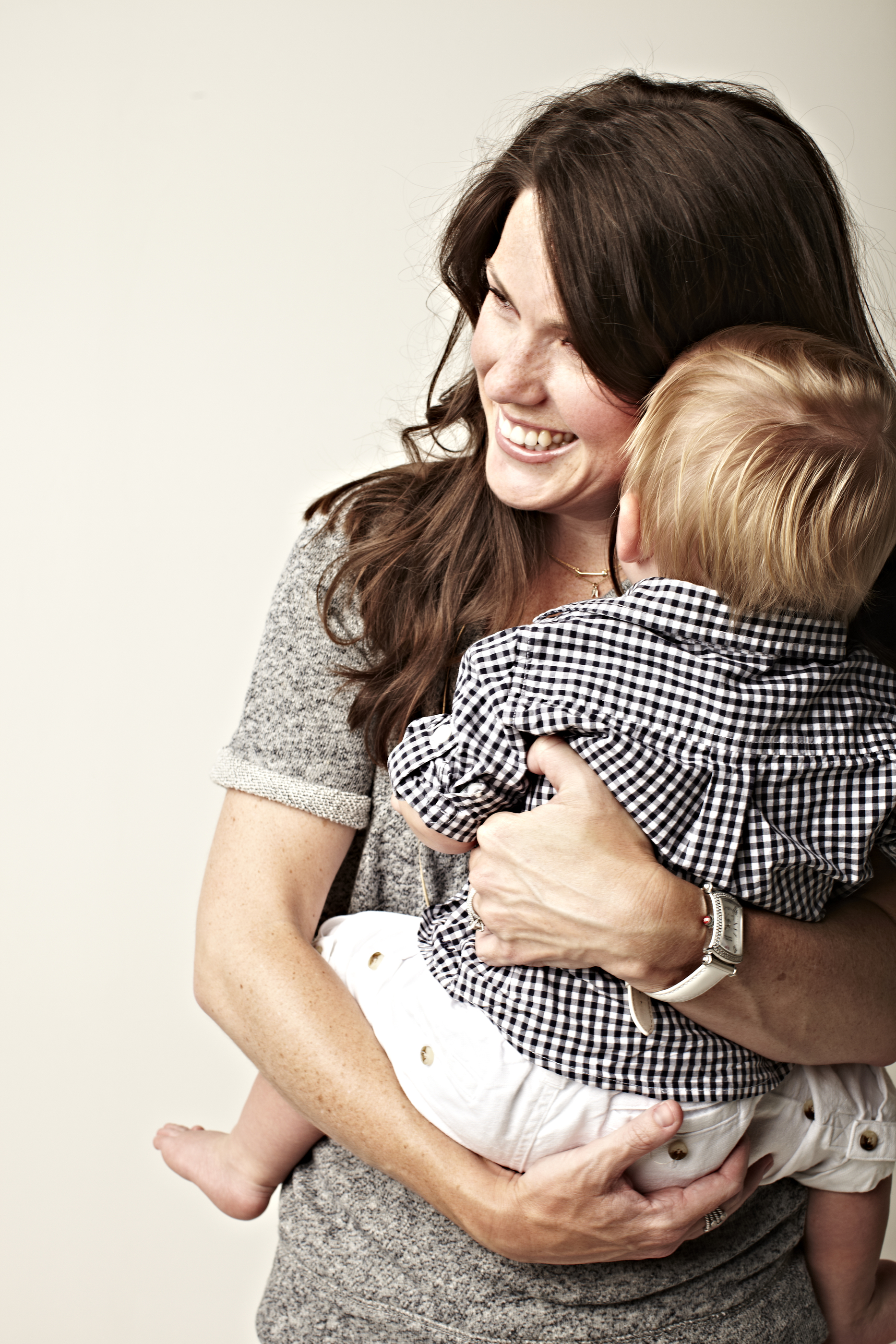 Woman holding her child