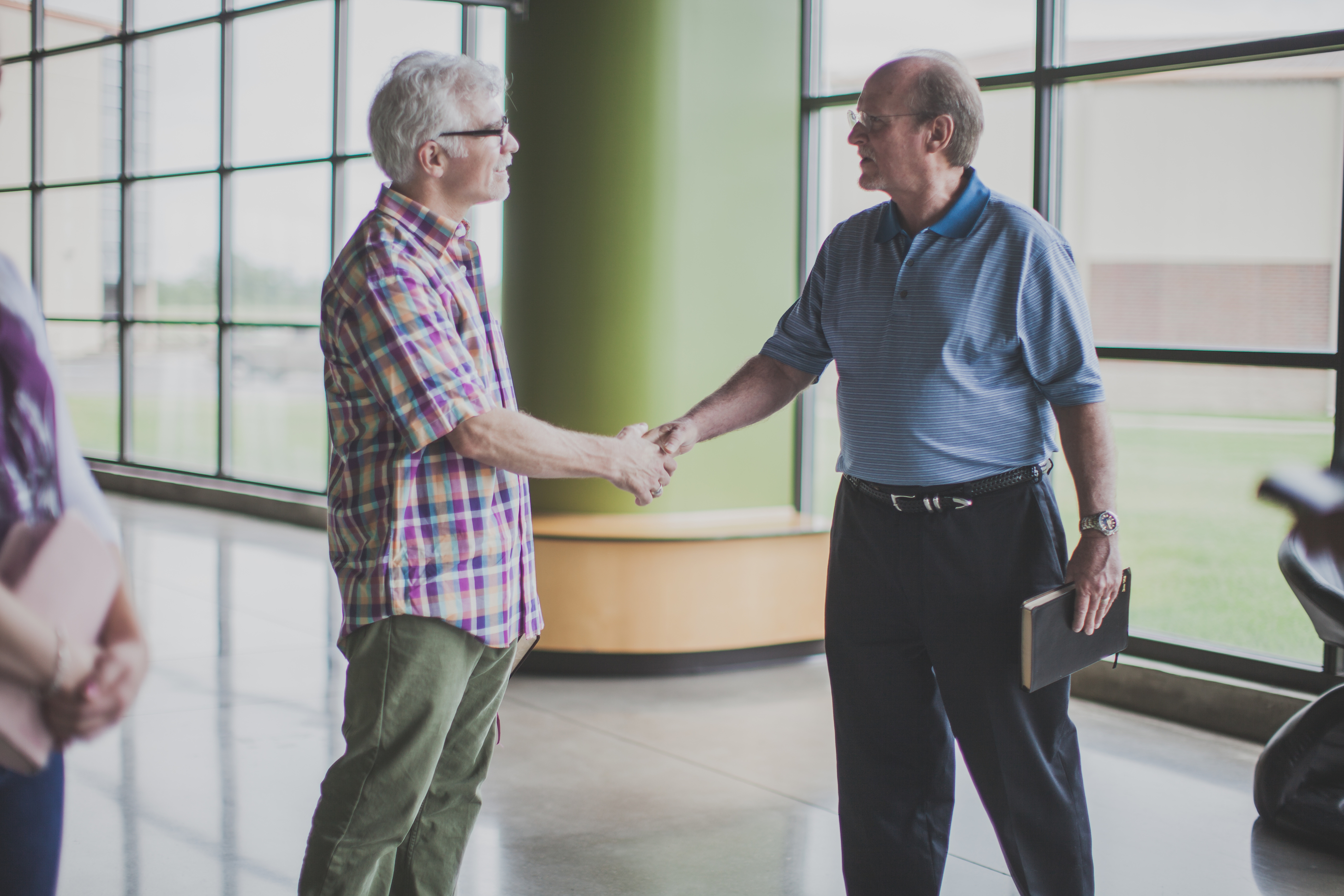 Ministry leaders greeting each other