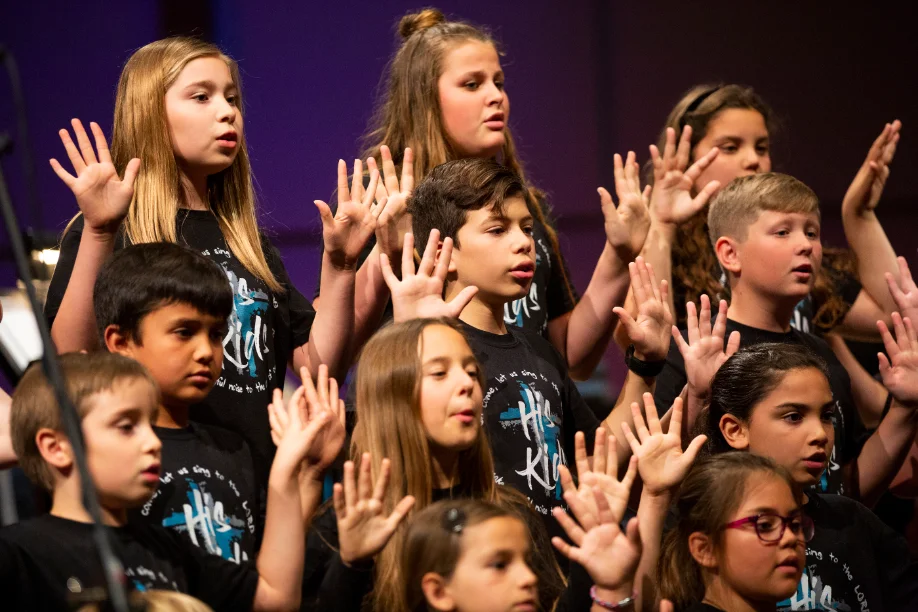 Children's choir performing at a church
