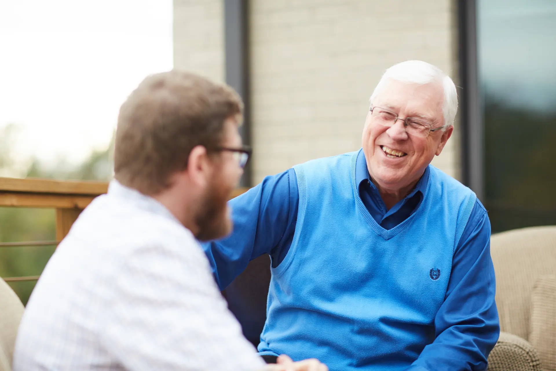 A ministry leader listening in conversation with a colleague